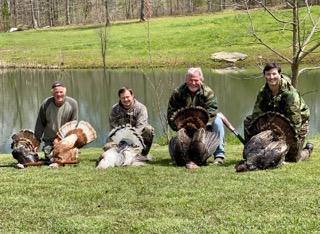 four huge turkeys caught